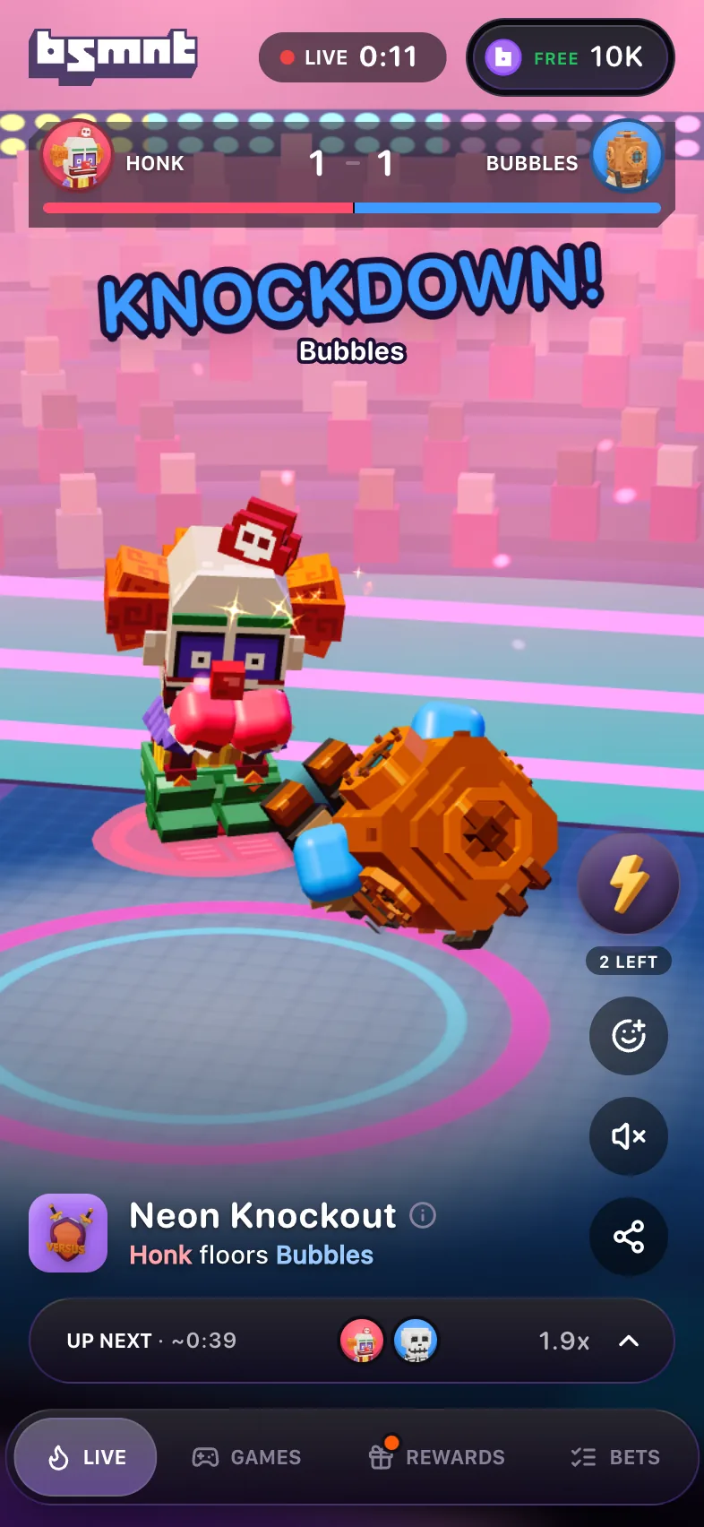 Live Neon Knockout card at 0:11 with KNOCKDOWN over Bubbles, who lies on the canvas beside Honk, the score 1 – 1 between Honk and Bubbles, and the line Honk floors Bubbles under the title