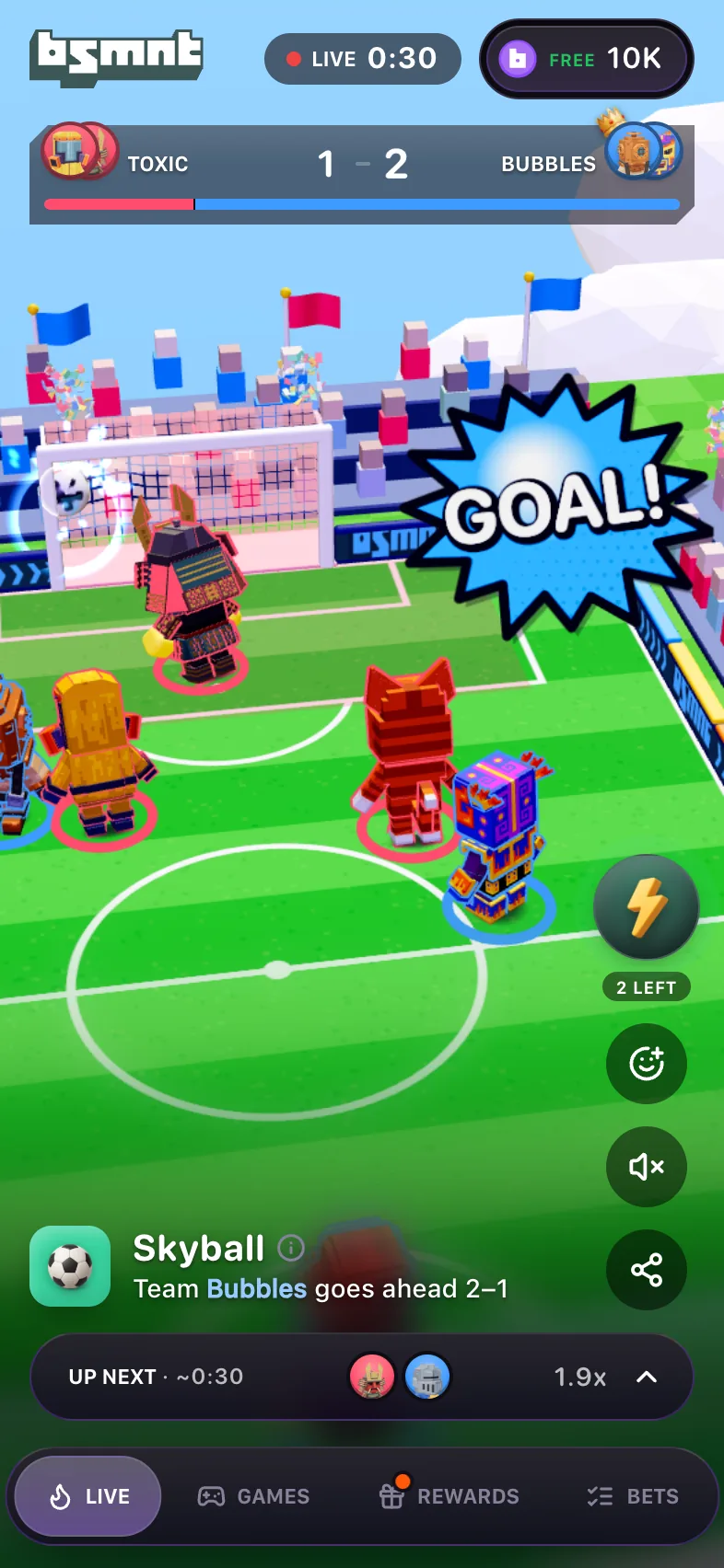 Live Skyball card at 0:30 with a GOAL burst by the far net, three players from each squad on the pitch, Toxic's squad trailing Bubbles' squad 1 – 2 on the scoreboard, and the line Team Bubbles goes ahead 2–1 under the title