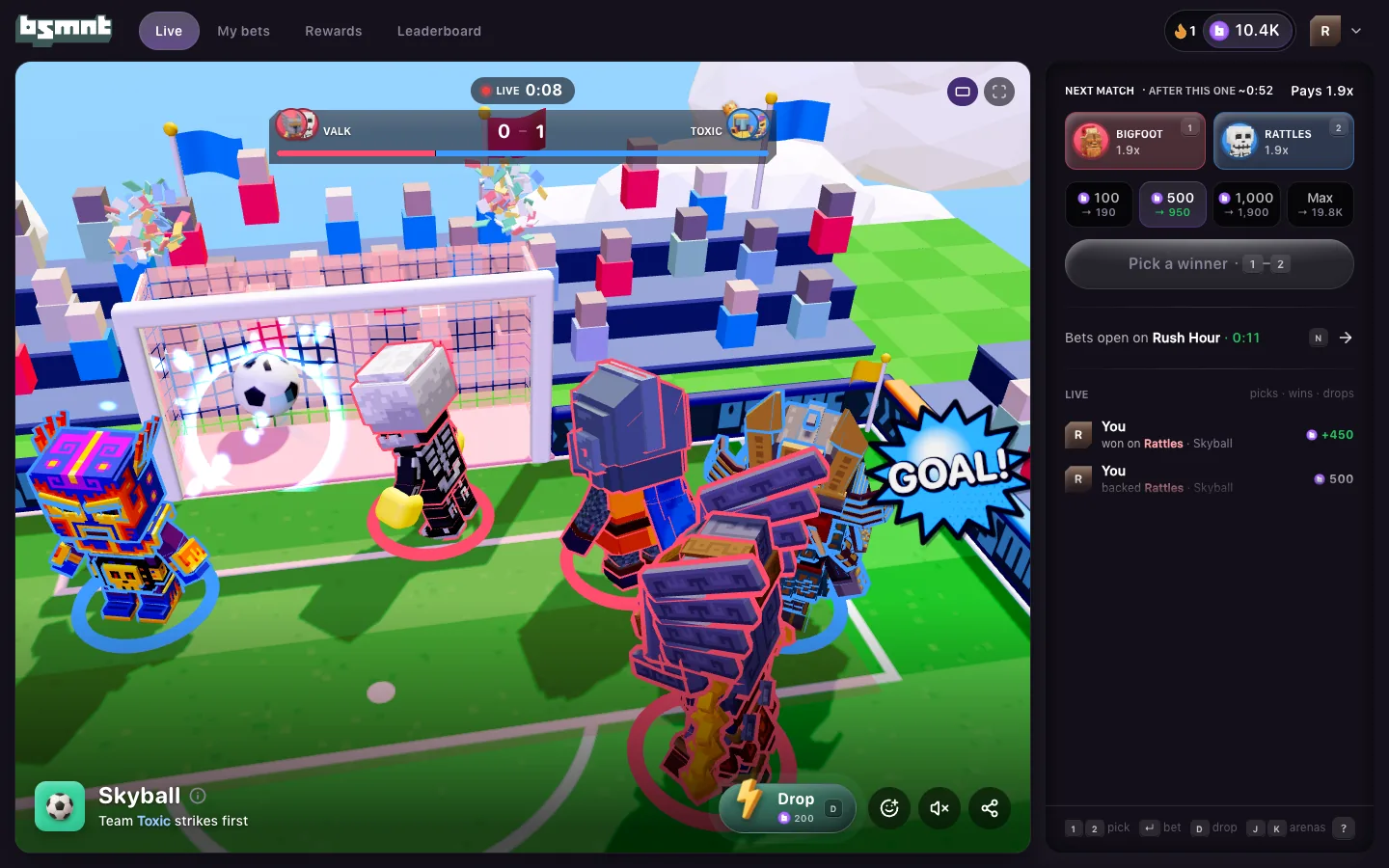 Theater mode with no arenas rail: a Skyball match fills the stage as Team Toxic scores to lead 1-0, and the bet slip on the right offers the next match between Bigfoot and Rattles at 1.9x
